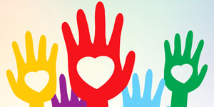 Tecknad bild av flera händer i olika färger med ett utklippt hjärta i mitten, som hålls uppåt.